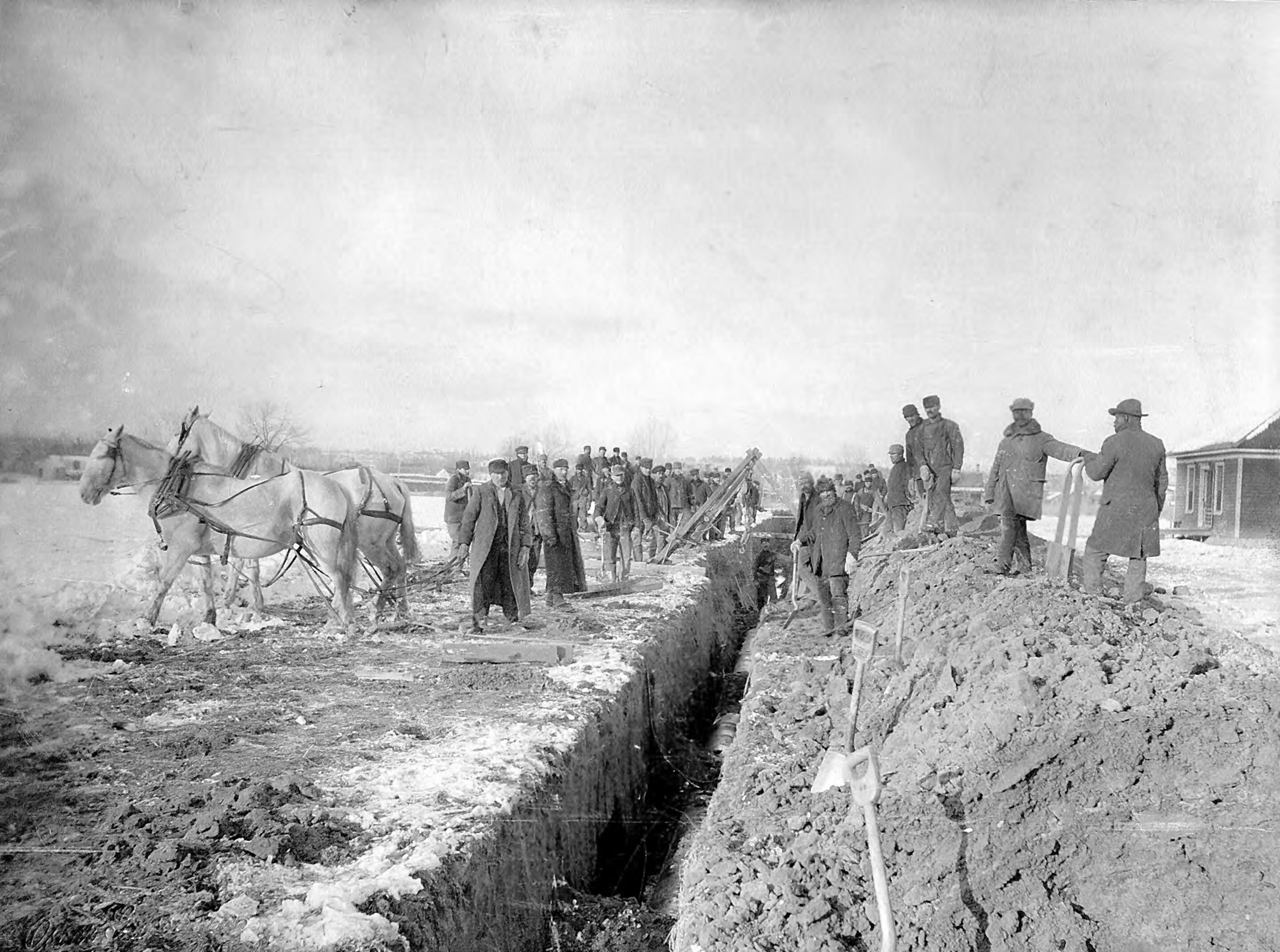 vintage photo of employees digging a water ditch