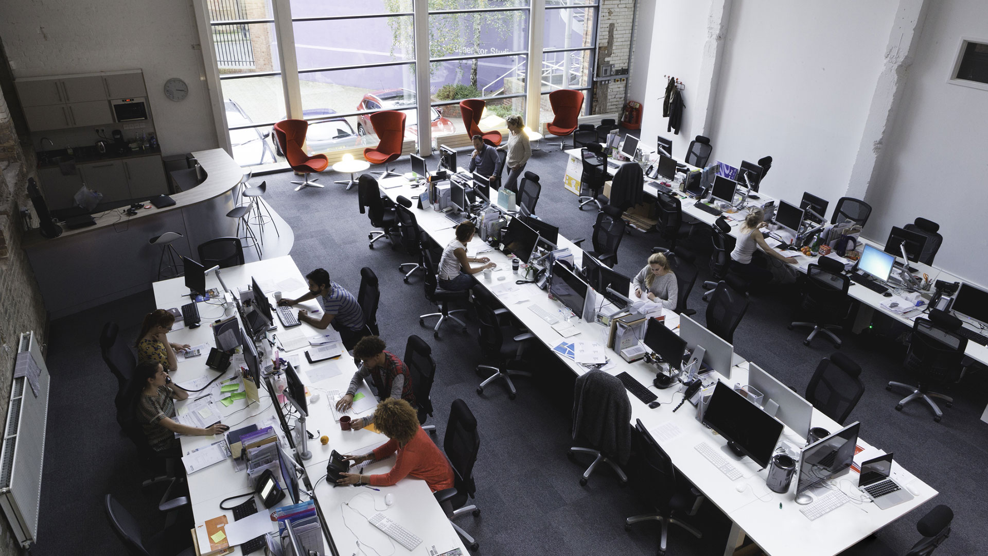people working in a large office