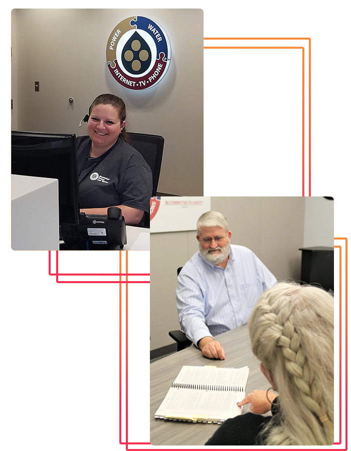 woman at desk and man and woman talking