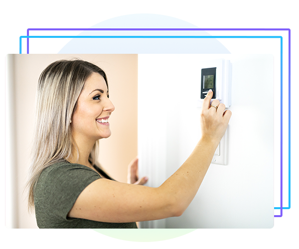 woman changing thermostat