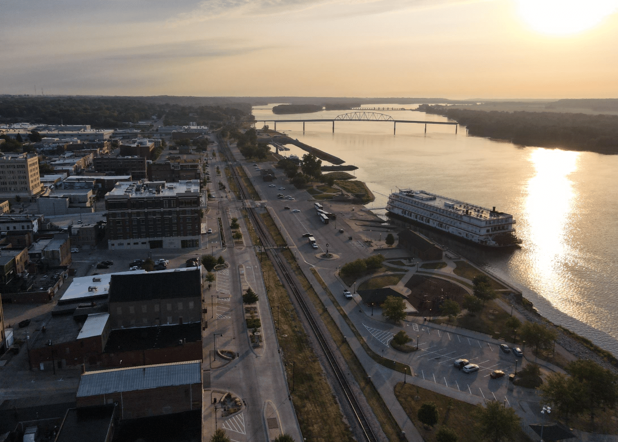 Drone image from the Muscatine riverfront show a river boat cruise parked at the harbor