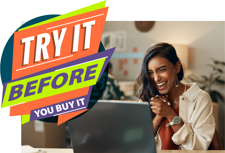 Happy women looking at laptop. Try it Before you Buy it in corner of photo
